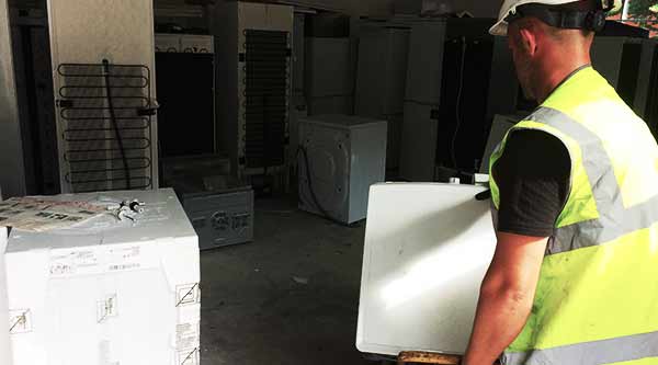a howarths fridge expert removing a fridge freezer for sheffield scrap pick up